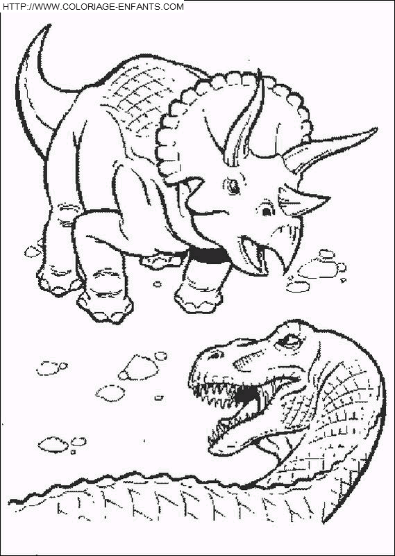 coloriage dinosaure un triceratops attaquant