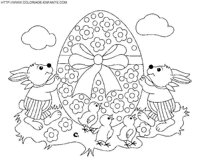 coloriage paques des lapins decorent un oeuf